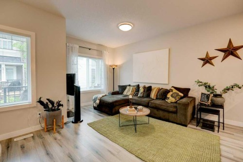 561 Canals Crossing Sw, Airdrie, AB - Indoor Photo Showing Living Room
