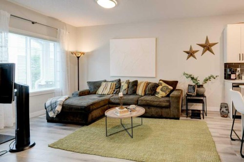 561 Canals Crossing Sw, Airdrie, AB - Indoor Photo Showing Living Room