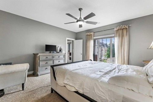 22 Wendham Place Sw, Calgary, AB - Indoor Photo Showing Bedroom