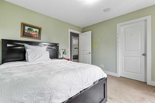 22 Wendham Place Sw, Calgary, AB - Indoor Photo Showing Bedroom