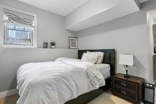 22 Wendham Place Sw, Calgary, AB - Indoor Photo Showing Bedroom