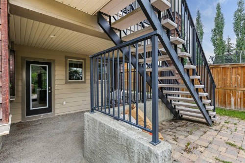 22 Wendham Place Sw, Calgary, AB - Outdoor With Deck Patio Veranda