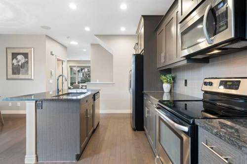 393 Nolanfield Way Nw, Calgary, AB - Indoor Photo Showing Kitchen With Upgraded Kitchen