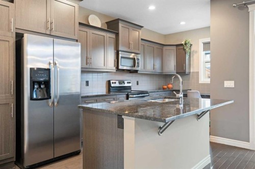 393 Nolanfield Way Nw, Calgary, AB - Indoor Photo Showing Kitchen With Upgraded Kitchen