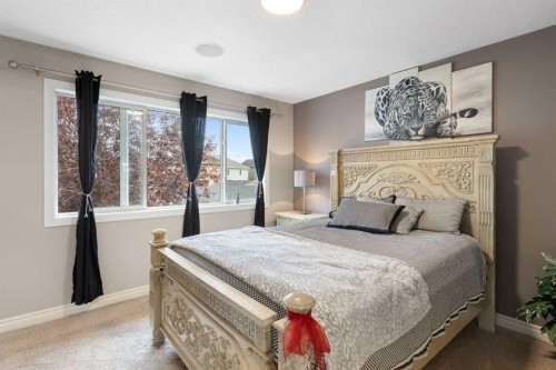 393 Nolanfield Way Nw, Calgary, AB - Indoor Photo Showing Bedroom