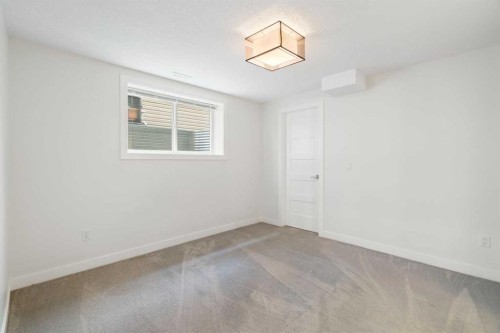 393 Nolanfield Way Nw, Calgary, AB - Indoor Photo Showing Other Room