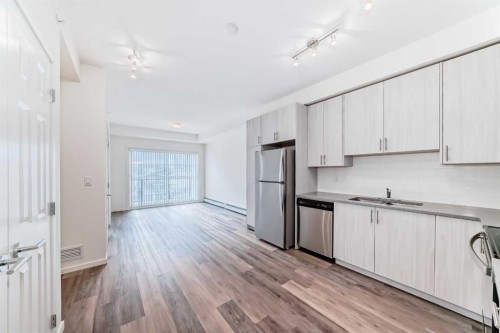 2411-298 Sage Meadows Park Nw, Calgary, AB - Indoor Photo Showing Kitchen With Stainless Steel Kitchen With Double Sink