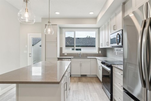 16 Alderwood Close Se, Calgary, AB - Indoor Photo Showing Kitchen With Stainless Steel Kitchen With Upgraded Kitchen