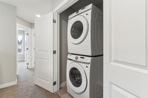 16 Alderwood Close Se, Calgary, AB - Indoor Photo Showing Laundry Room