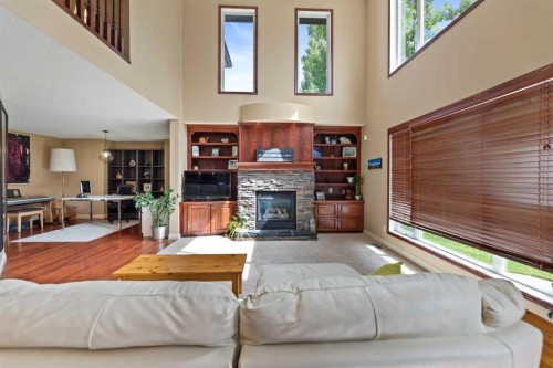 182 Sienna Park Drive Sw, Calgary, AB - Indoor Photo Showing Living Room With Fireplace