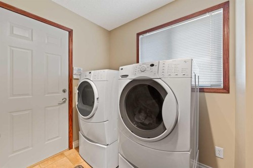 182 Sienna Park Drive Sw, Calgary, AB - Indoor Photo Showing Laundry Room