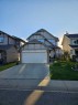 15 Kingsland Way Se, Airdrie, AB  - Outdoor With Facade 