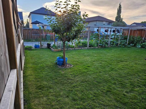 15 Kingsland Way Se, Airdrie, AB - Outdoor With Deck Patio Veranda