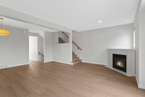 7 Prominence View Sw, Calgary, AB - Indoor With Fireplace