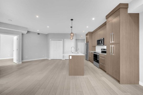 2301-681 Savanna Boulevard Ne, Calgary, AB - Indoor Photo Showing Kitchen