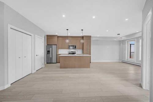 2301-681 Savanna Boulevard Ne, Calgary, AB - Indoor Photo Showing Kitchen