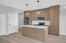 2301-681 Savanna Boulevard Ne, Calgary, AB  - Indoor Photo Showing Kitchen With Double Sink 