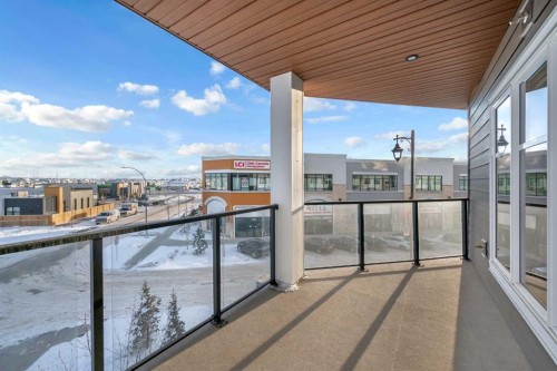 2301-681 Savanna Boulevard Ne, Calgary, AB - Outdoor With Balcony With Exterior