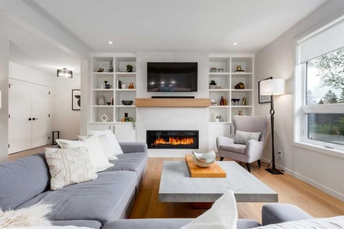 1408 Crescent Road Nw, Calgary, AB - Indoor Photo Showing Living Room With Fireplace