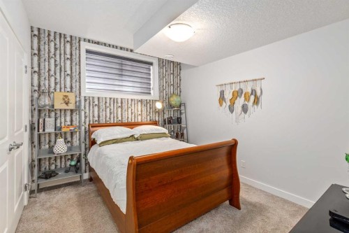 10 Cranbrook Hill Se, Calgary, AB - Indoor Photo Showing Bedroom