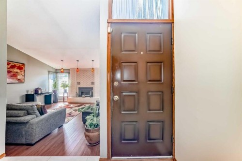 22 Glenhill Drive, Cochrane, AB - Indoor With Fireplace