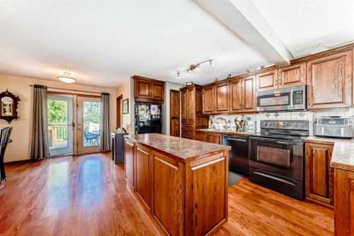 22 Glenhill Drive, Cochrane, AB - Indoor Photo Showing Kitchen