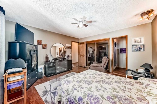 22 Glenhill Drive, Cochrane, AB - Indoor Photo Showing Bedroom