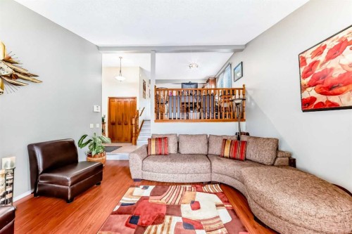 22 Glenhill Drive, Cochrane, AB - Indoor Photo Showing Living Room
