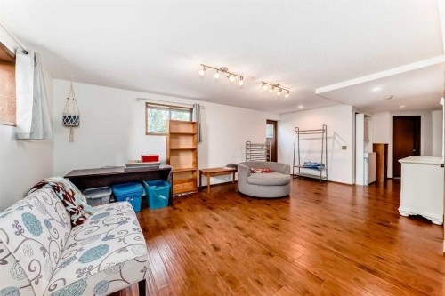 22 Glenhill Drive, Cochrane, AB - Indoor Photo Showing Living Room