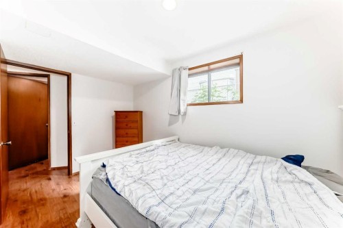 22 Glenhill Drive, Cochrane, AB - Indoor Photo Showing Bedroom
