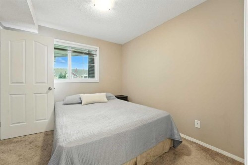 3311-10 Prestwick Bay Se, Calgary, AB - Indoor Photo Showing Bedroom