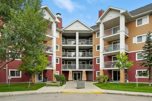 3311-10 Prestwick Bay Se, Calgary, AB - Outdoor With Balcony With Facade