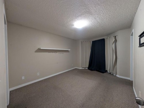 47 Saddleback Way Ne, Calgary, AB - Indoor Photo Showing Other Room