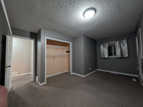 47 Saddleback Way Ne, Calgary, AB - Indoor Photo Showing Other Room