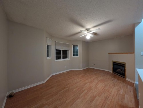 47 Saddleback Way Ne, Calgary, AB - Indoor With Fireplace
