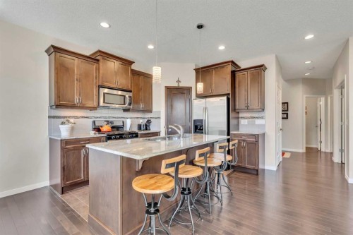 1544 Panatella Boulevard Nw, Calgary, AB - Indoor Photo Showing Kitchen With Stainless Steel Kitchen With Upgraded Kitchen