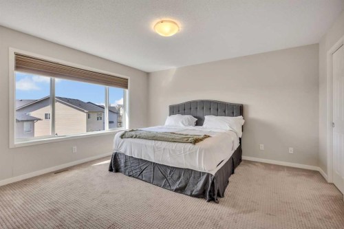 1544 Panatella Boulevard Nw, Calgary, AB - Indoor Photo Showing Bedroom