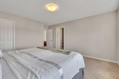 1544 Panatella Boulevard Nw, Calgary, AB - Indoor Photo Showing Bedroom