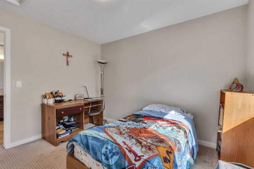 1544 Panatella Boulevard Nw, Calgary, AB - Indoor Photo Showing Bedroom