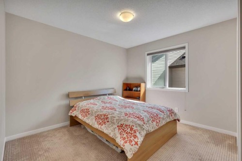 1544 Panatella Boulevard Nw, Calgary, AB - Indoor Photo Showing Bedroom