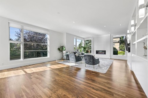 3926 9 Street Sw, Calgary, AB - Indoor Photo Showing Living Room With Fireplace