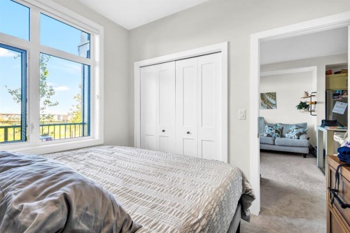 106-50 Sage Hill Walk Nw, Calgary, AB - Indoor Photo Showing Bedroom