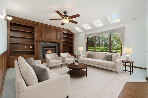 1600 Evergreen Hill Sw, Calgary, AB - Indoor Photo Showing Living Room With Fireplace