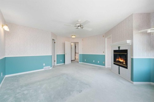 1600 Evergreen Hill Sw, Calgary, AB - Indoor With Fireplace