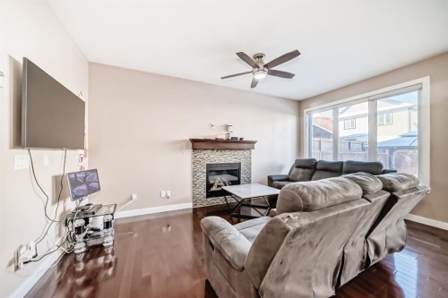 40 Saddlelake Gardens Ne, Calgary, AB - Indoor Photo Showing Living Room With Fireplace