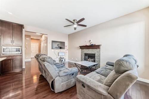 40 Saddlelake Gardens Ne, Calgary, AB - Indoor Photo Showing Living Room With Fireplace