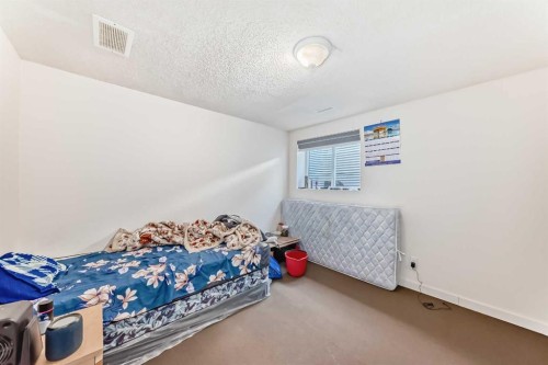 5307 Madigan Drive Ne, Calgary, AB - Indoor Photo Showing Bedroom