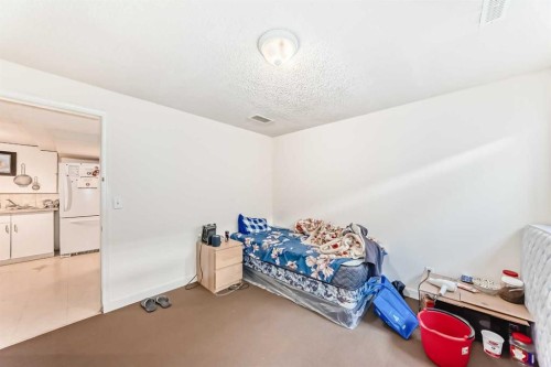 5307 Madigan Drive Ne, Calgary, AB - Indoor Photo Showing Bedroom