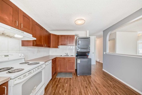 5307 Madigan Drive Ne, Calgary, AB - Indoor Photo Showing Kitchen With Double Sink