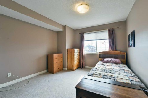 6 Royal Birkdale Court Nw, Calgary, AB - Indoor Photo Showing Bedroom